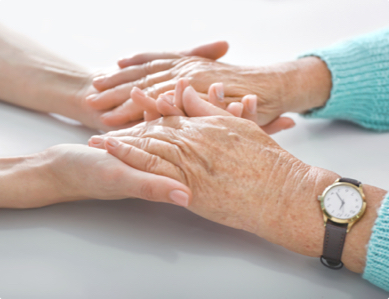Healthcare professional reassuring patient